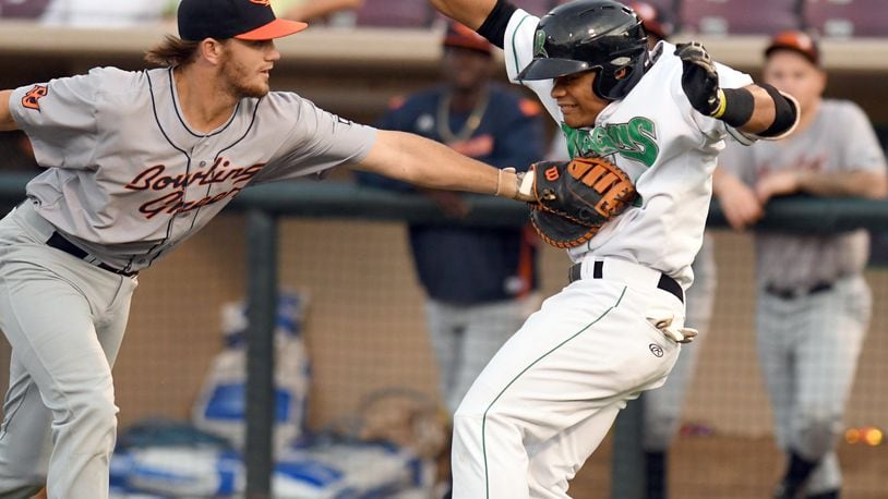 Dragons baserunner Randy Ventura tries to avoid the tag Tuesday night at Fifth Third Field. The Dragons beat the Bowling Green Hot Rods 12-0. BRANDY GUINAUGH / CONTRIBUTED