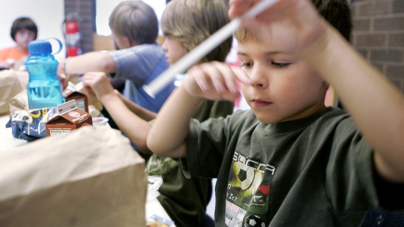 June 22, 2010. Children eat lunch at the Moraine Civic Center as they participate in the Summer Food Service Program.