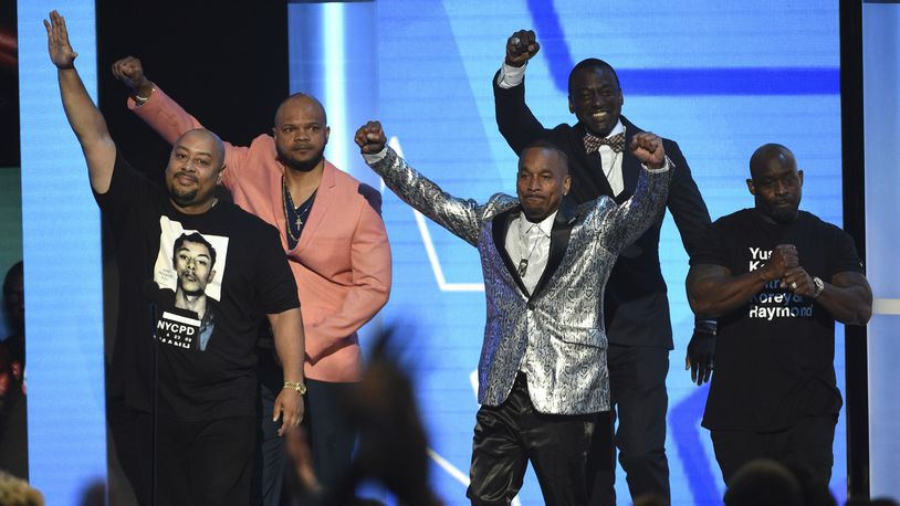 Raymond Santana Jr, from left, Kevin Richardson, Korey Wise, Yusef Salaam, and Antron McCray, also known as The Exonerated Five, introduce a performance by H.E.R. and YBN Cordae at the BET Awards on Sunday, June 23, 2019, at the Microsoft Theater in Los Angeles.