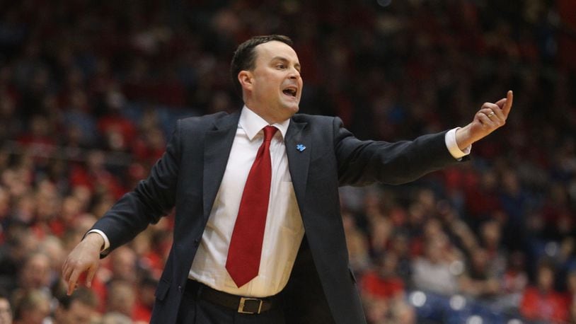 Archie Miller yells to his players during a game against Duquesne. David Jablonski/Staff