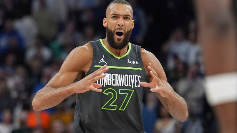 FILE -Minnesota Timberwolves center Rudy Gobert reacts after a Sacramento Kings basket during the second half of an NBA basketball game Friday, March 1, 2024, in Minneapolis. Rudy Gobert wins record-tying 4th Defensive Player of the Year award, Tuesday, May 7, 2024 (AP Photo/Abbie Parr, File)