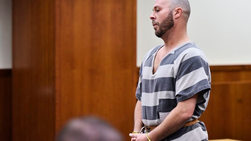 Dustin Pedersen, charged with aggravated robbery in connection with bank robberies in Trenton and West Chester Township, appeared in Middletown Municipal Court for a preliminary hearing Wednesday, Jan. 3 in Middletown. NICK GRAHAM/STAFF