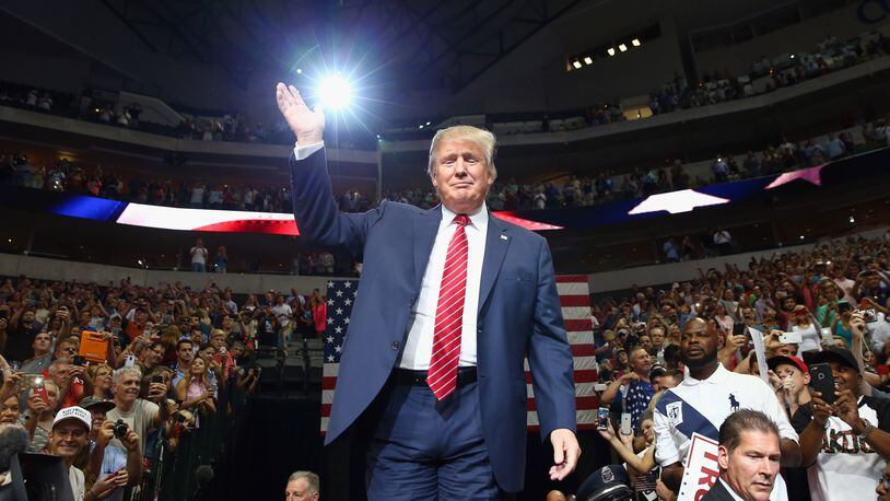 DALLAS, TX - SEPTEMBER 14: Republican presidential candidate Donald Trump arrives at a campaign rally at the American Airlines Center on September 14, 2015 in Dallas, Texas. More than 20,000 tickets have been distributed for the event. (Photo by Tom Pennington/Getty Images)