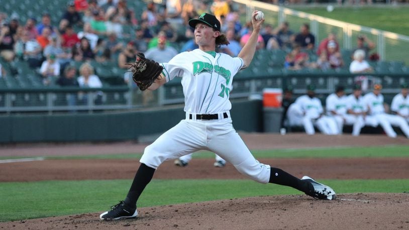 Dayton Dragons pitcher Packy Naughton delivers a pitch during Monday’s 3-1 loss to Lansing at Fifth Third Field on Monday night. Michael Cooper/CONTRIBUTED