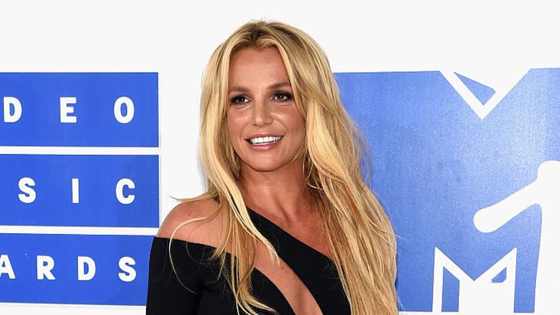 Britney Spears showed off her flexibly and tight abs in gym selfies posted April 30.  (Photo by Jamie McCarthy/Getty Images)