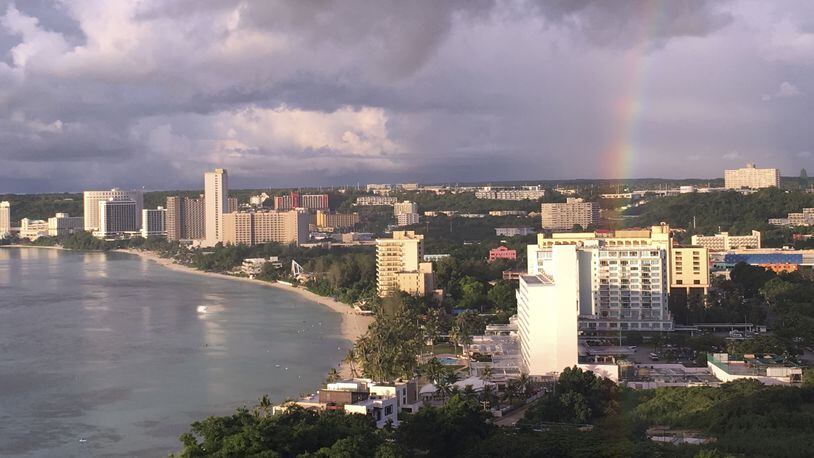 A rainbow appears over Tumon Bay, Guam Sunday, Aug. 13, 2017. Residents of the U.S. Pacific island territory of Guam face a missile threat from North Korea. (AP Photo/Tassanee Vejpongsa)