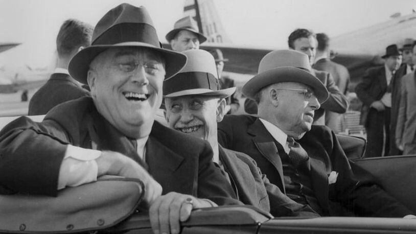 President Franklin Roosevelt, along with Orville Wright, during a visit to Wright Field on Oct. 12, 1940. FDR's motorcade went downtown to Courthouse Square where he addressed a crowd estimated at 100,000.