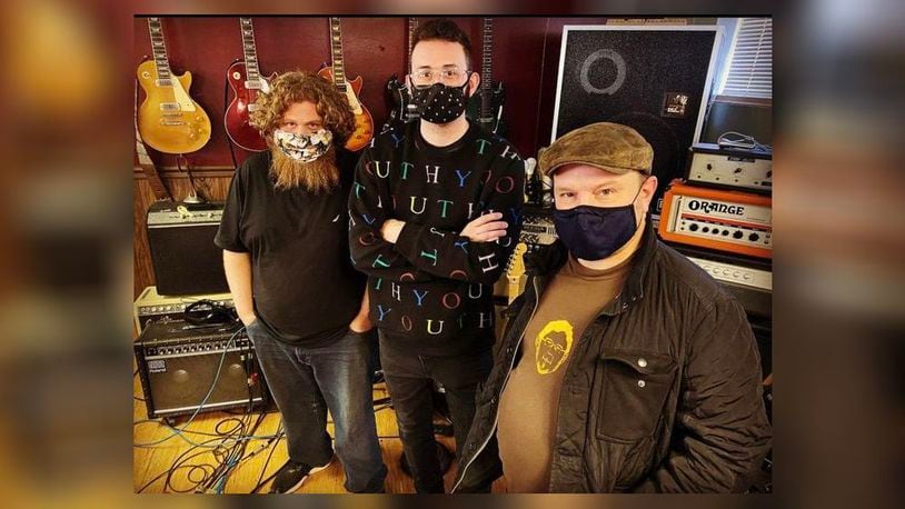 Left to right: Patrick Himes, Zack Sliver and Brian Hoeflich in Reel Love Recording Company, where they recorded Yuppie’s latest EP, “Peculiar.”