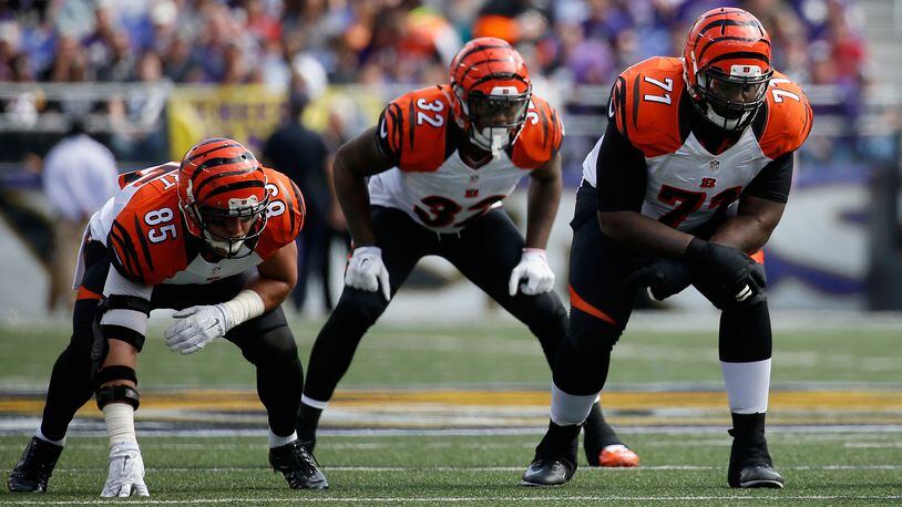 BALTIMORE, MD - SEPTEMBER 27: Tyler Eifert #85, Jeremy Hill #32 and Andre Smith #71 of the Cincinnati Bengals line up against the Baltimore Ravens defense at M&T Bank Stadium on September 27, 2015 in Baltimore, Maryland. (Photo by Rob Carr/Getty Images)