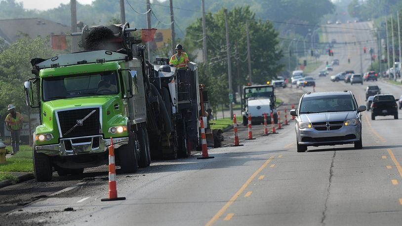 Resurfacing work on Wilmington Pike in Kettering started Wednesday morning,  July 26, 2023 near Stroop Road. MARSHALL GORBY\STAFF
