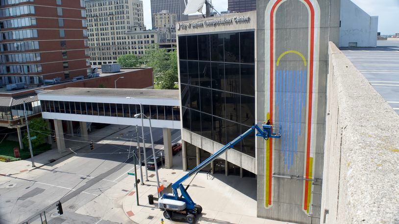 A new artwork, created by artist Atalie Gagnet, has been completed on the Dayton Transportation Center garage. CHEYANNE LUMPKIN / CONTRIBUTED PHOTO