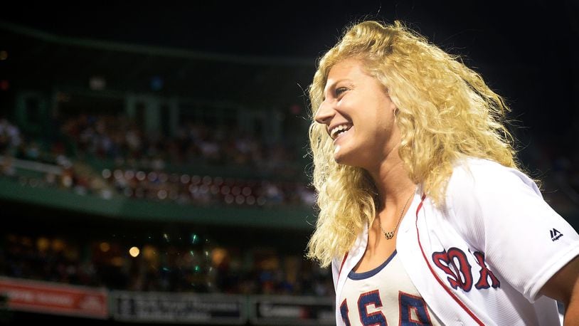 BOSTON, MA - AUGUST 28: Olympic gold medal Judoka Kayla Harrison is introduced before throwing out a ceremonial first pitch before a game between the Boston Red Sox and the Kansas City Royals on August 28, 2016 at Fenway Park in Boston, Massachusetts. (Photo by Adam Glanzman/Getty Images)