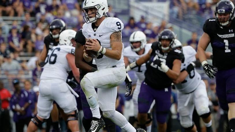 Penn State quarterback Trace McSorley (9) scores a touchdown by running during the second half of an NCAA college football game against Northwestern in Evanston, Ill., Saturday, Oct. 7, 2017. Penn State won 31-7. (AP Photo/Nam Y. Huh)