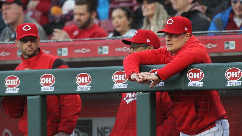 Reds manager David Bell, right, watches the action during a game against the Brewers on Tuesday, April 2, 2019, at Great American Ball Park in Cincinnati. David Jablonski/Staff