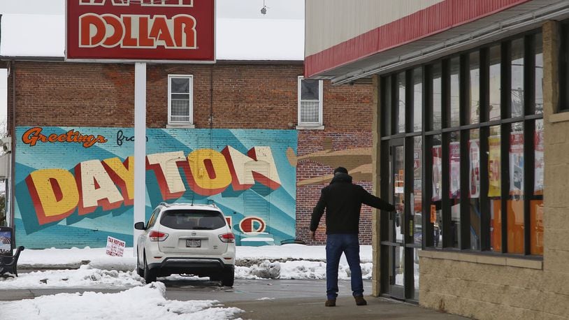 A Family Dollar is shown on East Fifth Street in Dayton. Thousands of people shop at the 69 Dollar General, Dollar Tree and Family Dollar stores within 10 miles of downtown Dayton. TY GREENLEES / STAFF