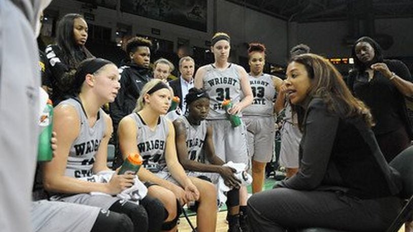 Katrina Merriweather talks to some of her players during Sunday’s game vs. Oakland at the Nutter Center. Tim Zechar/Contributed photo