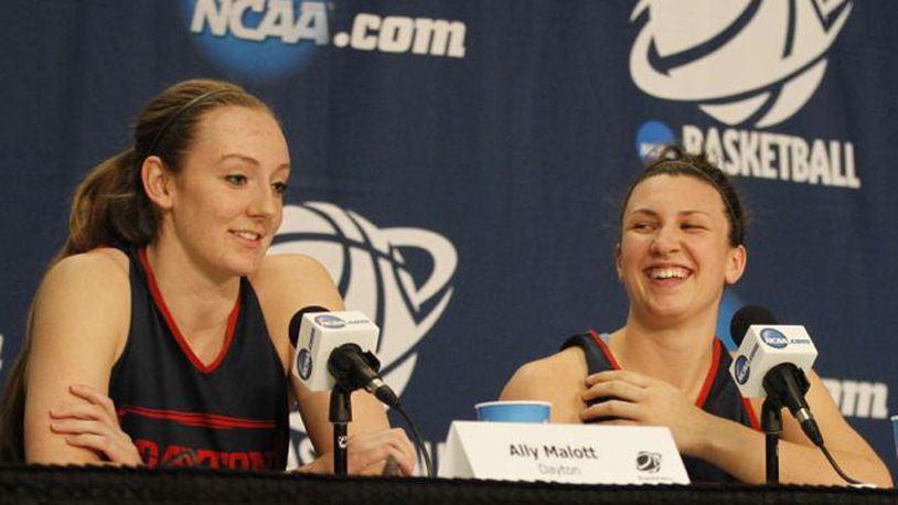 Dayton’s Ally Malott, left, and Andrea Hoover speak at a press conference in March, 2015, at the Times Union Center in Albany, N.Y. David Jablonski/Staff