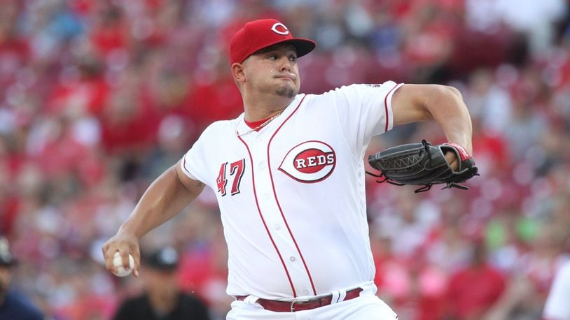 Reds starter Sal Romano pitches against the Brewers on Friday, June 29, 2018, at Great American Ball Park in Cincinnati. David Jablonski/Staff