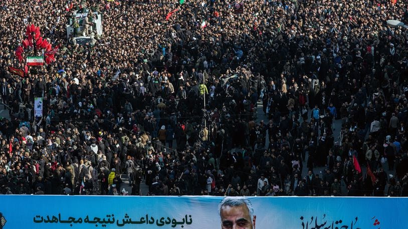 A banner bearing the likeness of Maj. Gen. Qassem Soleimani is carried during a funeral procession in Tehran on Monday, Jan. 6, 2019. Soleimani was killed by the United States on Friday in Baghdad in a drone strike. (Arash Khamooshi/The New York Times)