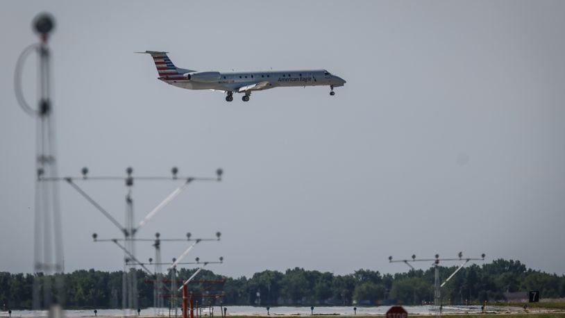 A passenger plane lands at Dayton International Airport Friday morning June 3, 2022. According to a recent survey, Dayton International Airport saw the biggest airfare increase of airport across the country. JIM NOELKER/STAFF
