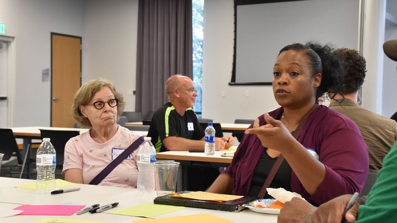 Participants discuss solutions to improve life in Dayton at a forum hosted by Your Voice Ohio and the  Dayton Daily News, Monday, Sept. 30, 2019.