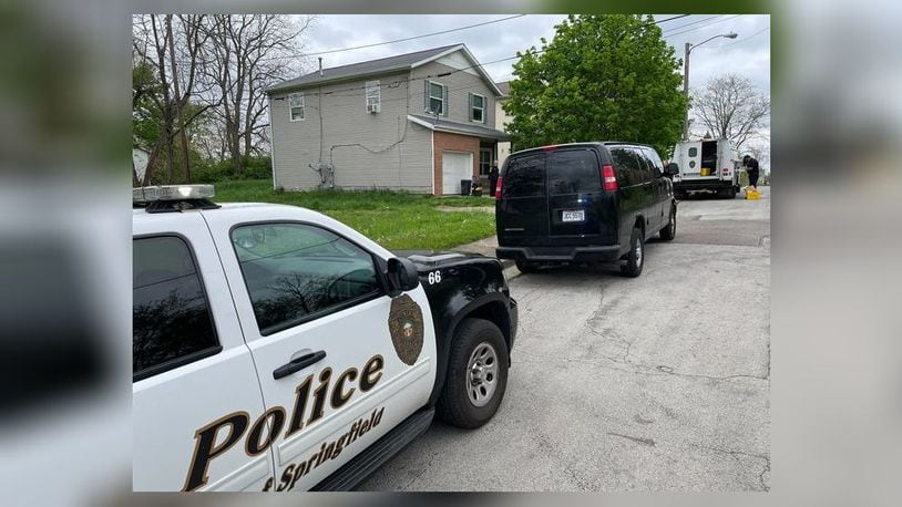Springfield police raided a house Thursday, May 5, 2022, in the 400 block of Vine Street. BILL LACKEY/STAFF