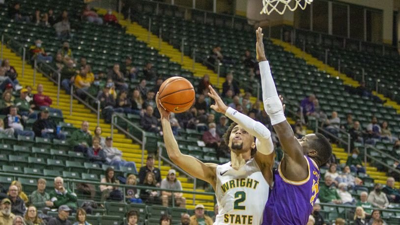 Wright State's Tanner Holden puts up a shot vs. Tennessee Tech on Saturday at the Nutter Center. Jeff Gilbert/CONTRIBUTED