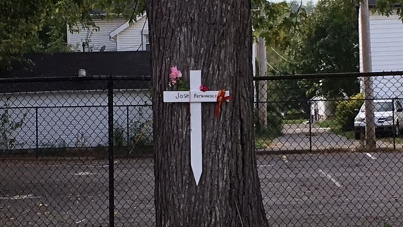 A cross was placed as a memorial near the site in Miamisburg where Joseph Fernandez was killed Friday night when he was struck by a train in Miamisburg. CONTRIBUTED PHOTO
