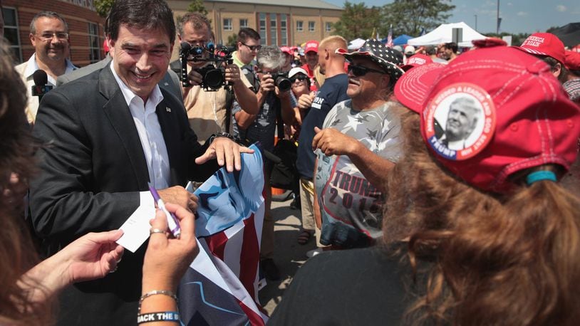 Republican congressional candidate Troy Balderson greets guests before the start of a rally with President Donald Trump August 4, 2018 in Lewis Center, Ohio. Balderson faces Democratic challenger Danny O’Connor for Ohio’s 12th Congressional District on Tuesday. Trump was at the rally to show support for Balderson. (Photo by Scott Olson/Getty Images)