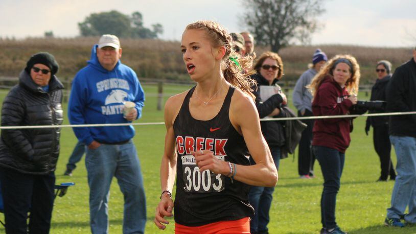 Beavercreek junior Taylor Ewert won the Division I girls cross country district championship in a course-record 17:13.93 at Cedarville University on Saturday. Contributed / Greg Billing
