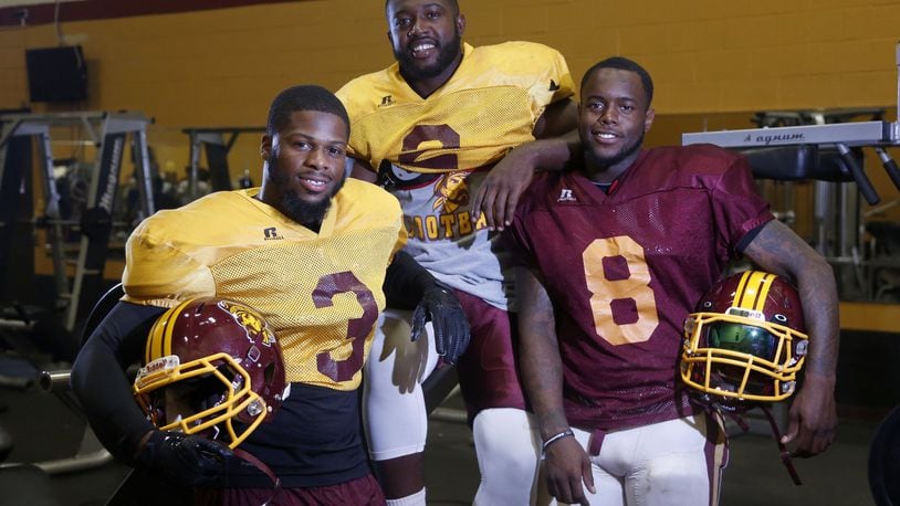 Central State University football players Clim Robbins, Deonate Gary and De’Michael Jackson (left to right) have joined the Marauders for this season of football. LISA POWELL / STAFF