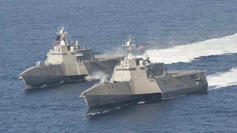 The littoral combat ships USS Independence, left, and USS Coronado are underway in the Pacific Ocean in this 2014 photo. (U.S. Navy photo by Chief Mass Communication Specialist Keith DeVinney)