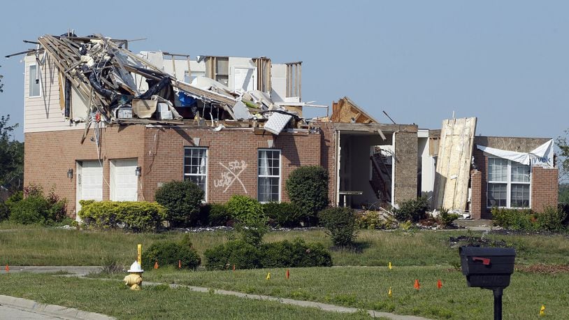 Tornado damaged home in Moss Creek development, Trotwood. Many homes in this former golf course were destroyed by the Memorial Day tornado. TY GREENLEES / STAFF