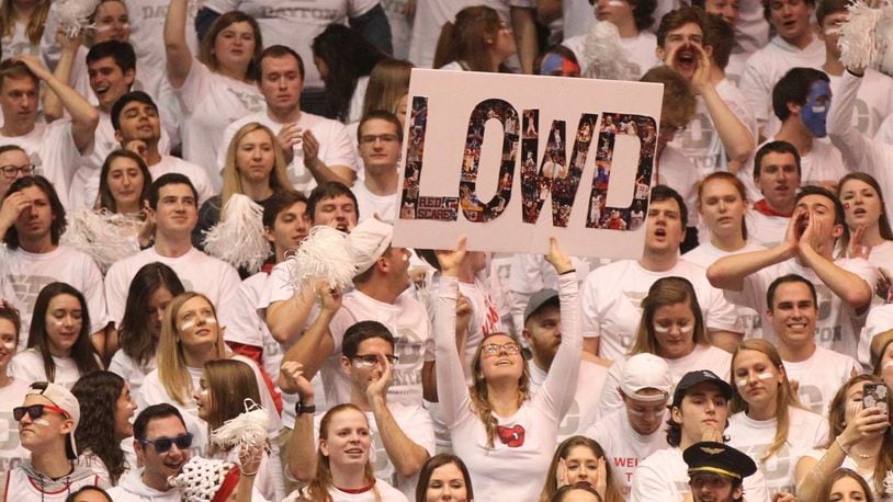 Dayton fan Emily Lazar holds up a sign in the student section cheer during a game against Virginia Commonwealth on Saturday, Feb. 16, 2019, at UD Arena. David Jablonski/Staff