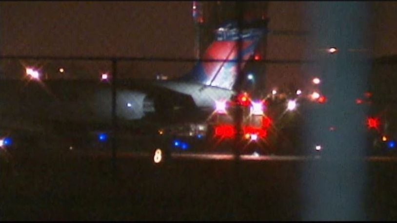 Emergency vehicles respond to the distressed plane at Dayton International Airport. JAROD THRUSH / STAFF