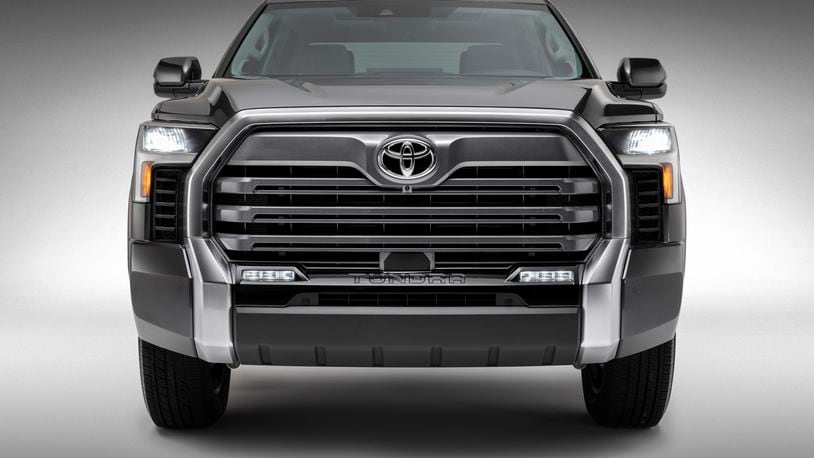 This photo provided by Toyota shows the 2022 Toyota Tundra Limited.  Toyota is dumping the big V8 engine in the latest redesign of its Tundra full-size pickup truck, a bold move in a market that likes big, powerful engines. The 381 horsepower, 5.7-liter V8 will be replaced by a base 389 horsepower 3.5-liter twin-turbo V6.  (Toyota via AP)