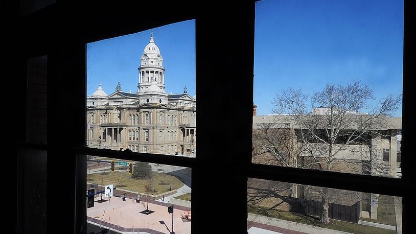 The current Miami County Courthouse is visible across West Main Street from inside the Troy Tavern/IOOF building, which the Troy Historic Preservation Alliance is trying to save. Part of the Tavern/IOOF building served as a courthouse in the 19th century. MARSHALL GORBY\STAFF