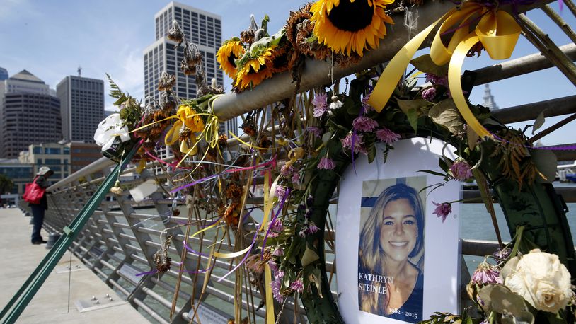Flowers and a portrait of Kate Steinle remain at a memorial site on Pier 14 in San Francisco in this July 17, 2015, file photo. A jury Nov. 30, 2017, acquitted a Mexican man of homicide who was at the center of immigration debate in the San Francisco pier shooting.