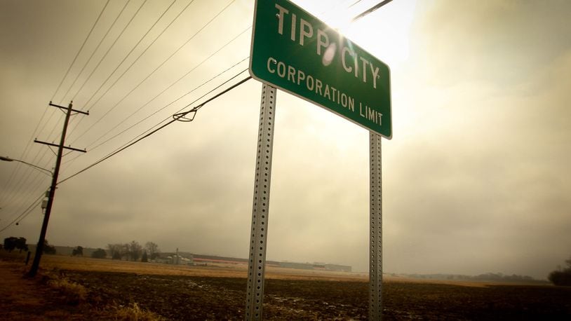 The existing Meijer distribution center in the distance behind the Tipp City limits sign. JIM WITMER/STAFF