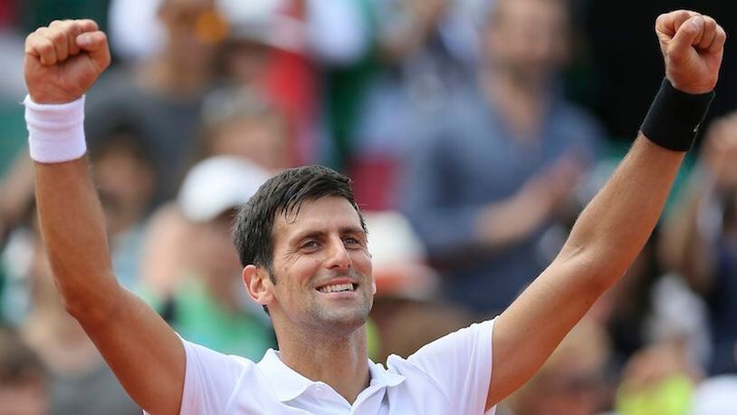 FILE - In this May 31, 2017, file photo, Serbia's Novak Djokovic celebrates after defeating Portugal's Joao Sousa during their second round match of the French Open tennis tournament at the Roland Garros Stadium, in Paris. Novak Djokovic has won three Wimbledon titles and normally would be considered a real likely candidate for a fourth, but he has not played up to his usual standards over the past year. (AP Photo/David Vincent, File)