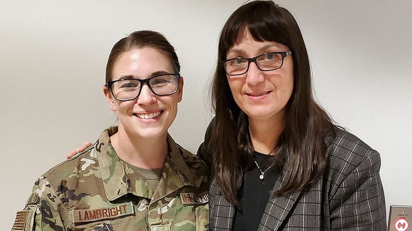Staff Sgt. Chaya Lambright (left), a medical laboratory technician with the 711 Human Performance Wing, was recently recognized for assisting Bridget Kleismit (right) during a medical emergency at the Wright Field Fitness Center on Wright-Patterson Air Force Base. (U.S. Air Force photo)