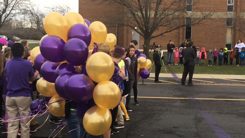 Dayton Christian School students took part in a balloon launch Monday as the school announced the start of a $6 million capital campaign to build a gym. NICK BLIZZARD/STAFF