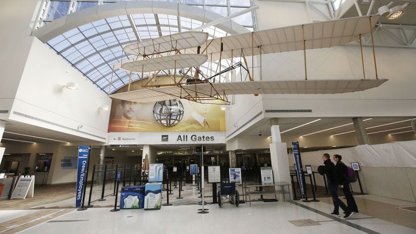 Renovation to the center of the Dayton Airport terminal has been completed with a new terrazzo floor, wider TSA exit and new restrooms. TY GREENLEES / STAFF