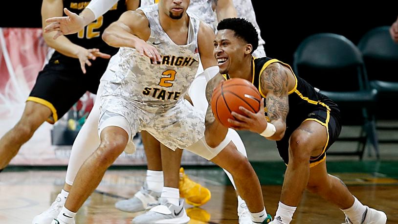 Wright State guard Tanner Holden covers Milwaukee guard Te’Jon Lucas during a Horizon League quarterfinal at the Nutter Center in Fairborn Mar. 2, 2021. Wright State lost 94-92. E.L. Hubbard/CONTRIBUTED