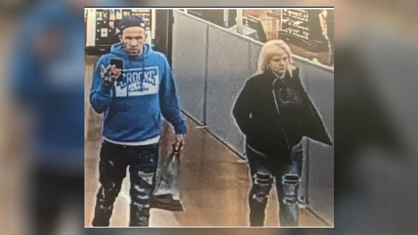 Dayton police are looking for two people suspected of using a stolen credit card at area businesses. Photo courtesy Dayton Police Department.
