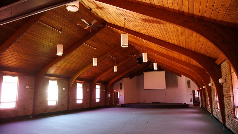 Interior of the former Emanuel Ministries church in Fairborn where Pastor Ancil Carter, 94,  plans to open a youth and family center that will serve three counties.  TY GREENLEES / STAFF