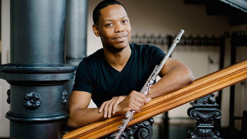 Dayton native Brandon Patrick George is a Grammy-nominated flutist. He returns home this month to perform with the Dayton Philharmonic Orchestra. MARCO BORGGREVE/COURTESY PHOTO