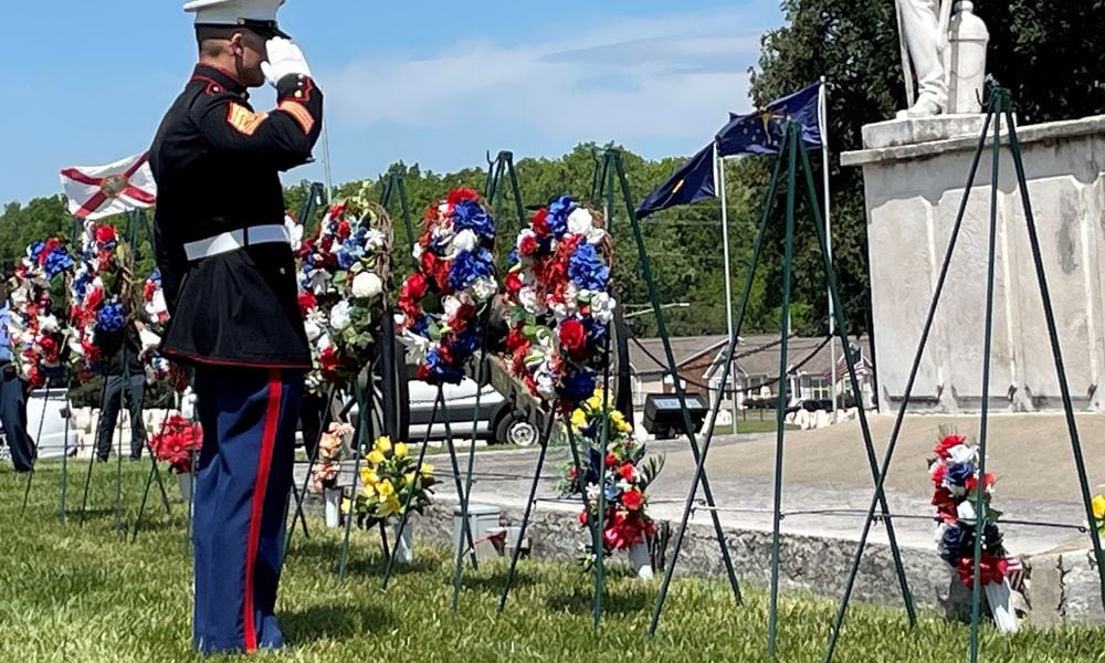 Members representing each branch of the military services set wreaths during Memorial Day ceremonies in 2023 at the Dayton National Cemetery. NICK BLIZZARD/STAFF