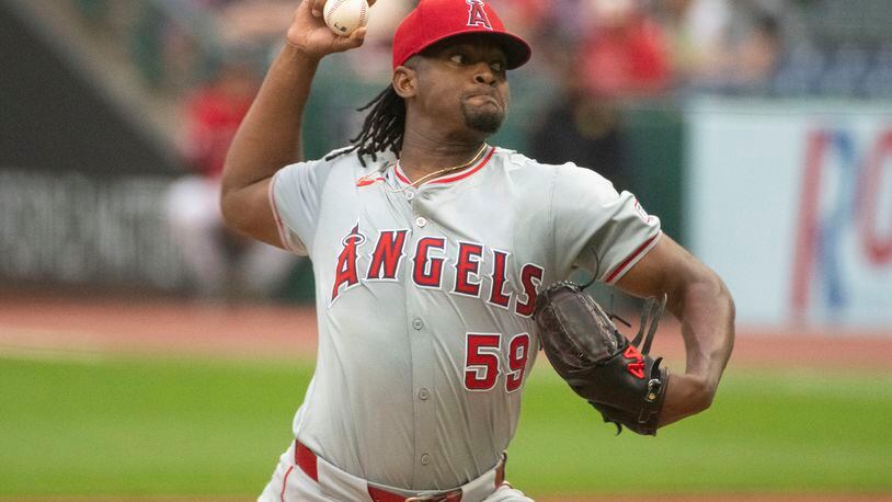 Los Angeles Angels starting pitcher Jose Soriano (59) delivers against the Cleveland Guardians during the first inning of a baseball game in Cleveland Friday, May. 3, 2024. (AP Photo/Phil Long)