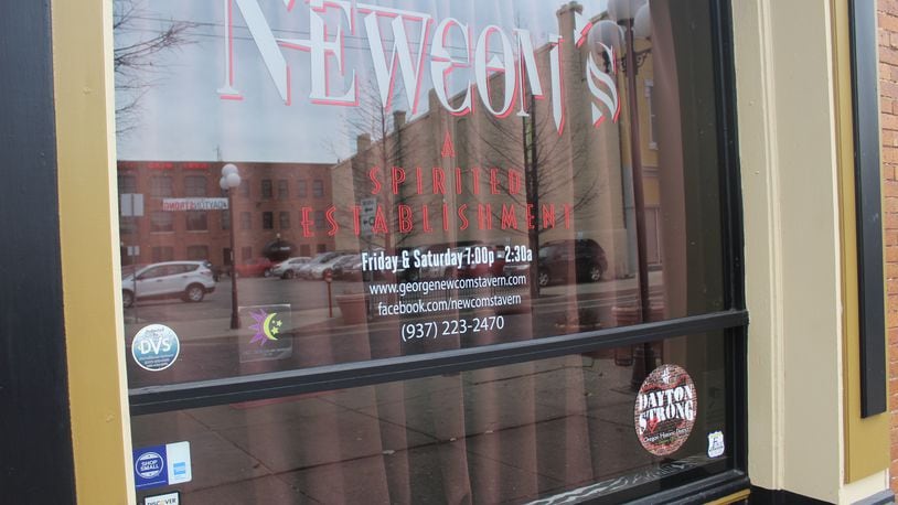 Newcom’s Tavern in the Oregon District is the latest business to close temporarily after an employee tests positive for the coronavirus. AMELIA ROBINSON / STAFF